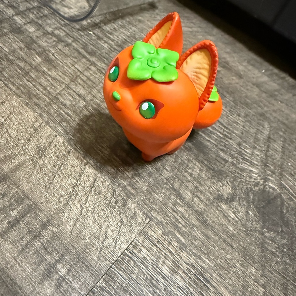 Orange Fox Figurine with Green Accents